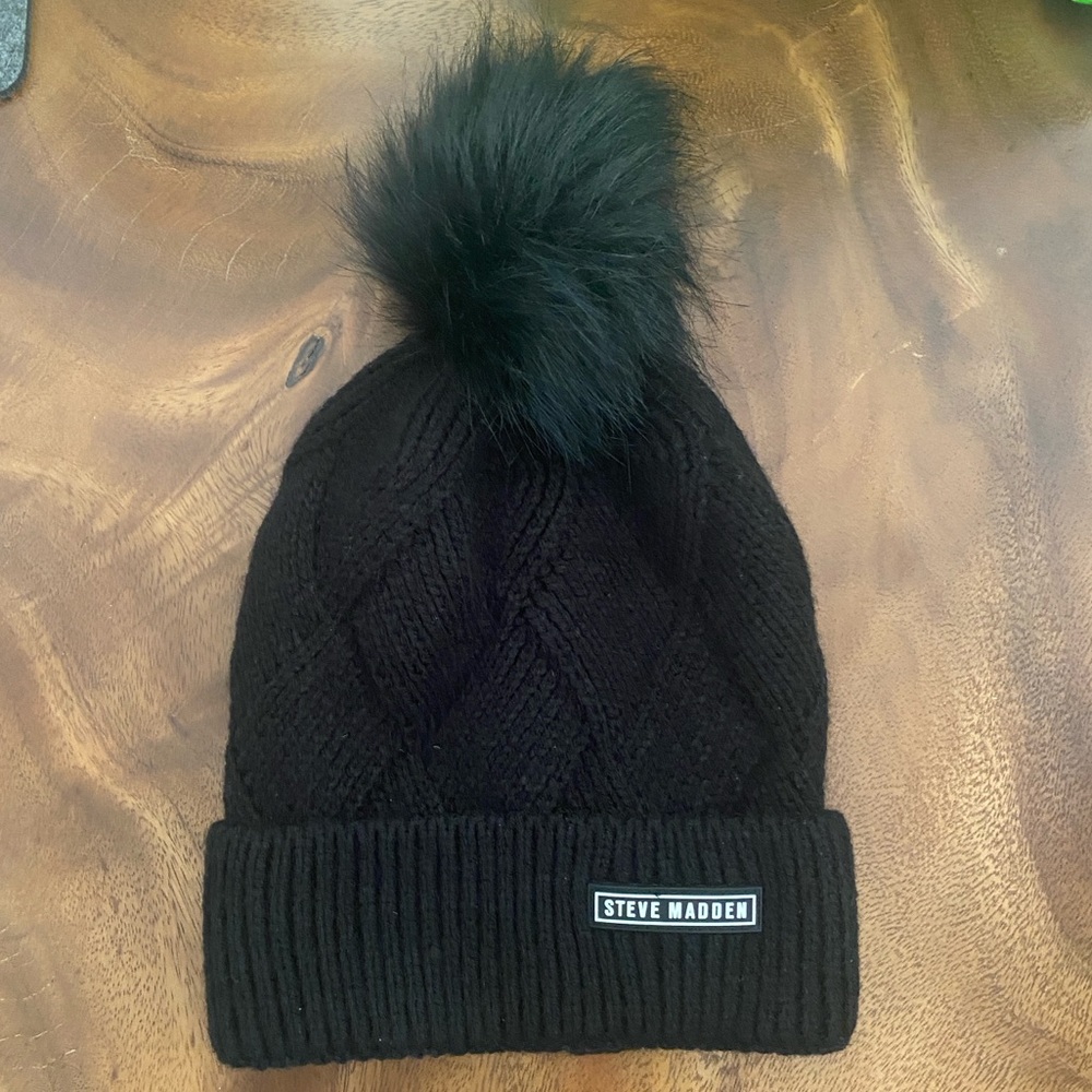 Steve Madden Women’s Wide Cuff Cable Knit Pom Beanie Hat